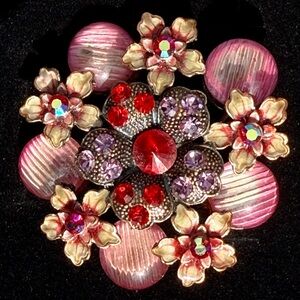 Elegant Floral Brooch with Red and Pink Accents